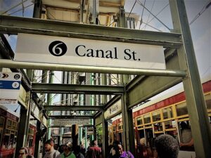 An image of the busy entrance to Canal Street subway in New Orleans.